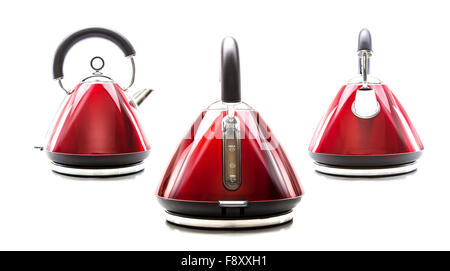 Three Red electric kettles on white background Stock Photo