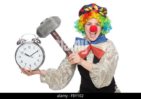 Female clown with alarm-clock and hammer isolated on white Stock Photo