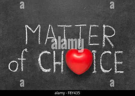 matter of choice phrase handwritten on blackboard with heart symbol instead O Stock Photo