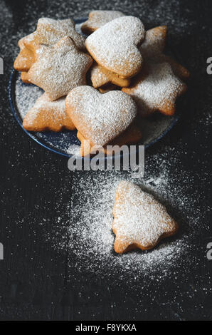 Traditional homemade christmas cookies on wooden table Stock Photo