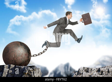 Image of young businessman jumping over gap Stock Photo