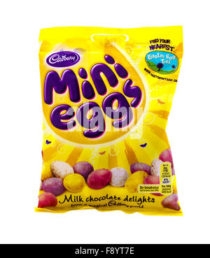 Packet of Cadbury's Mini Eggs on a White Background Stock Photo