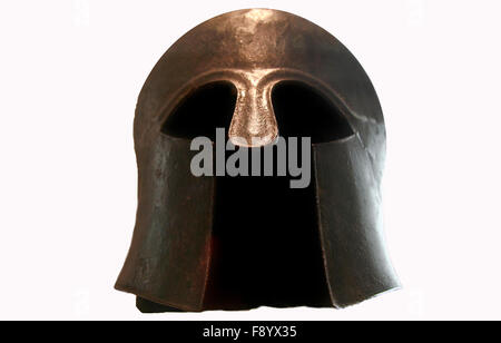 Ancient greek military helmet isolated on white Stock Photo