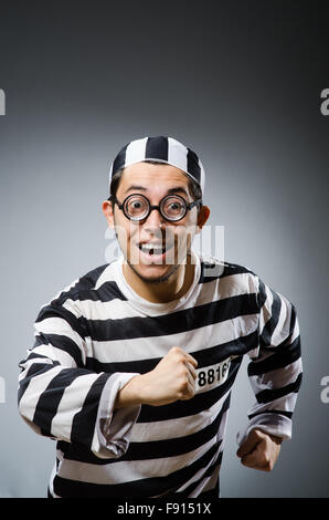 Prison inmate in funny concept Stock Photo