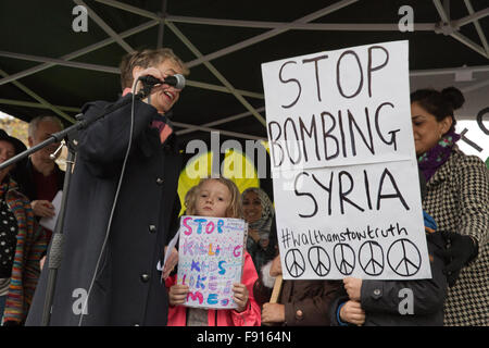 London, UK. 12th December, 2015. Children hold placards calling for an end to the bombing of Syria at the Stop The War Coalition protest outside Downing Street. Credit:  Mark Kerrison/Alamy Live News Stock Photo