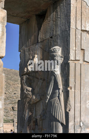 Bas relief of Darius the Great fighting a Lamassu (winged lion), doorway to Throne Hall, Persepolis, Iran Stock Photo