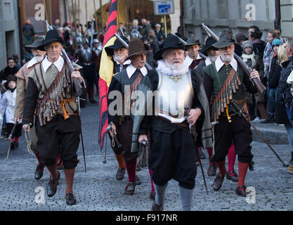 Geneva, Switzerland. 11th Dec, 1602. People dressed in ancient uniforms ...