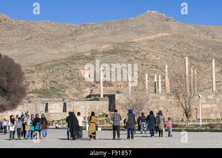 Iranians outside the main entrance to Persepolis, Iran Stock Photo