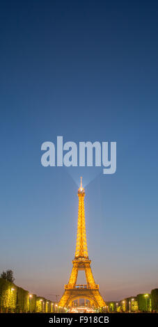 PARIS - JULY 12, 2013: Eiffel Tower on July 12, 2013 in Paris. Eiffel tower is one the most popular attractions in Paris Stock Photo