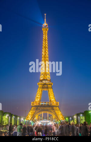 PARIS - JULY 12, 2013: Eiffel Tower on July 12, 2013 in Paris. Eiffel tower is one the most popular attractions in Paris Stock Photo