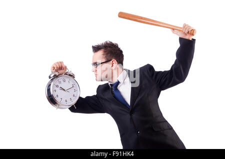 Man hitting the clock with baseball bat isolated on the white Stock Photo