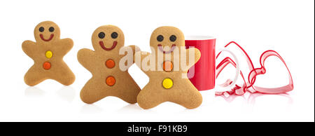 Three Gingerbread Men on a White background Stock Photo