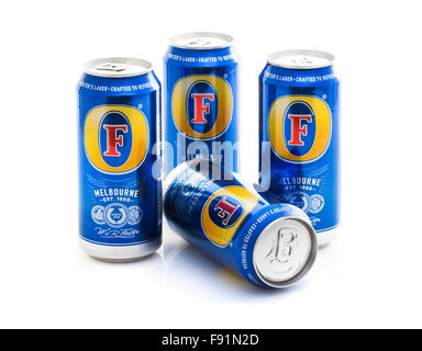 Four Cans of Foster's Lager of a White Background Stock Photo