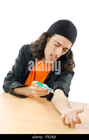 Drug addict during injection Stock Photo