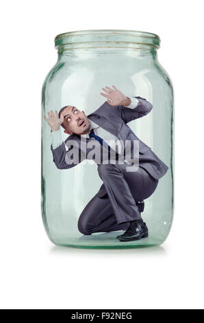 Young businessman in glass jar Stock Photo