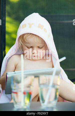Young girl with Ipad Stock Photo