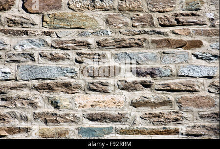 Beautiful old stone wall in the swiss alps Stock Photo