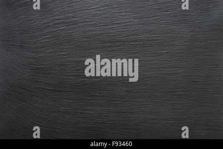 Black slate background or textured stony table close-up Stock Photo