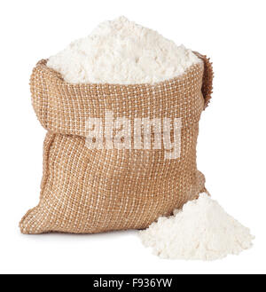 Flour in brown burlap sack and heap isolated on white background Stock Photo