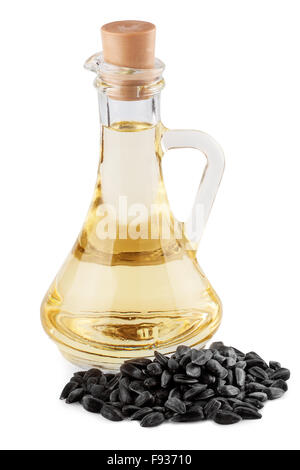 Sunflower oil with seeds isolated on white background Stock Photo