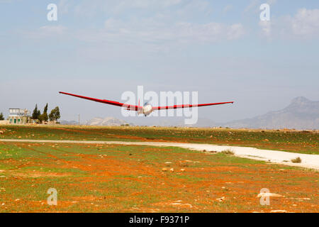 Alexander Schleicher ASK7m two seat training glider of the Cyprus Gliding group coming in to land at Mammari airstrip, Nicosia, Cyprus. Stock Photo