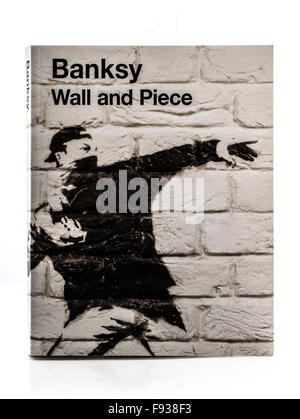 Cover Of Banksy Book Wall And Piece Showing Man Throwing Flowers Stock Photo Alamy