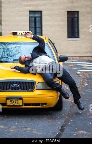 Alec Baldwin and Demi Moore on the set of their new movie 'Blind' in Brooklyn, NY. Stunt double of Alec Baldwin was hit by a taxi cab.  Featuring: Stunt double Where: NY, New York, United States When: 12 Nov 2015 Stock Photo
