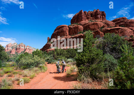 A couple on mountain bikes near Sedona Arizona. Stock Photo