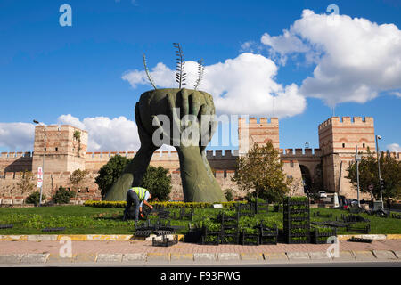 Peace and Culture Statue and ruins of ancient fortress wall of the Belgradkapi Stock Photo