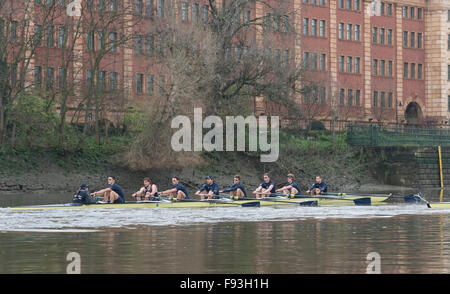 River Thames, UK. 13th December, 2015. Boat Race Trial VIIIs.  Oxford University Boat Club. Trial VIIIs serve as an important learning experience and selection test for the sixteen rowers and two coxes chosen. It is the only occasion during the season that the squad members race side-by-side for the entire four and a quarter miles of the Championship Course in a simulation of The BNY Mellon Boat Race. The two Oxford crews taking to the water have been named ‘”Business” and “Pleasure”. Credit:  Duncan Grove/Alamy Live News Stock Photo