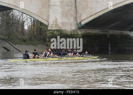 River Thames, UK. 13th December, 2015. Boat Race Trial VIIIs.  Oxford University Boat Club. Trial VIIIs serve as an important learning experience and selection test for the sixteen rowers and two coxes chosen. It is the only occasion during the season that the squad members race side-by-side for the entire four and a quarter miles of the Championship Course in a simulation of The BNY Mellon Boat Race. The two Oxford crews taking to the water have been named ‘”Business” and “Pleasure”. Credit:  Duncan Grove/Alamy Live News Stock Photo