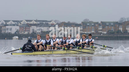 River Thames, UK. 13th December, 2015. Boat Race Trial VIIIs.  Oxford University Boat Club. Trial VIIIs serve as an important learning experience and selection test for the sixteen rowers and two coxes chosen. It is the only occasion during the season that the squad members race side-by-side for the entire four and a quarter miles of the Championship Course in a simulation of The BNY Mellon Boat Race. The two Oxford crews taking to the water have been named ‘”Business” and “Pleasure”. Credit:  Duncan Grove/Alamy Live News Stock Photo