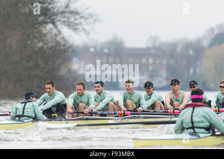 River Thames, UK. 13th December, 2015. Boat Race Trial VIIIs.  Cambridge  University Boat Club. Trial VIIIs serve as an important learning experience and selection test for the sixteen rowers and two coxes chosen. It is the only occasion during the season that the squad members race side-by-side for the entire four and a quarter miles of the Championship Course in a simulation of The BNY Mellon Boat Race. The two Cambridge crews taking to the water have been named ‘”Fuerte” and “Listo”. Credit:  Duncan Grove/Alamy Live News Stock Photo