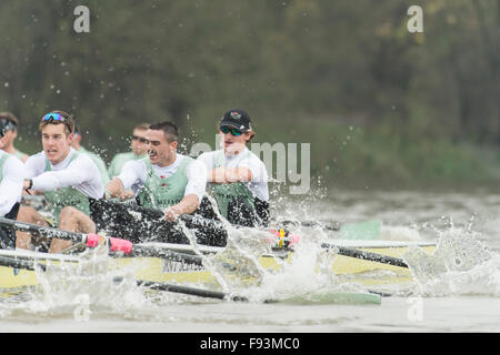 River Thames, UK. 13th December, 2015. Boat Race Trial VIIIs.  Cambridge  University Boat Club. Trial VIIIs serve as an important learning experience and selection test for the sixteen rowers and two coxes chosen. It is the only occasion during the season that the squad members race side-by-side for the entire four and a quarter miles of the Championship Course in a simulation of The BNY Mellon Boat Race. The two Cambridge crews taking to the water have been named ‘”Fuerte” and “Listo”. Credit:  Duncan Grove/Alamy Live News Stock Photo