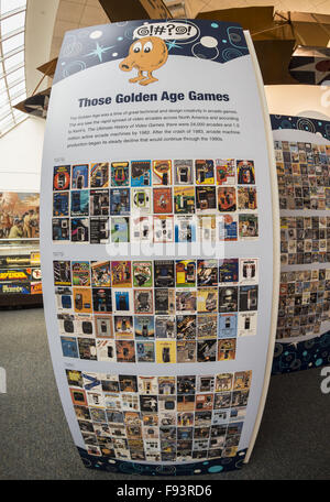 Garden City, New York, USA. 12th Dec, 2015. During Opening Day of Arcade Age exhibit, large displays with history of arcade games, including the Golden Age games starting in 1978, are at entrance to arcade set up at Cradle of Aviation Museum in Long Island. Exhibit runs from Dec. 12, 2015 through April 3, 2016. © Ann Parry/ZUMA Wire/Alamy Live News Stock Photo