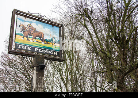 A pub sign outside the Plough pub in Sipson, an ancient village threatened with destruction due to Heathrow Airport expansion Stock Photo