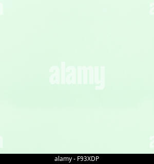 square background from light green color toned sheet of paper Stock Photo