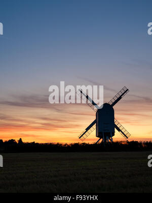 Chillenden Windmill in the Kent countryside, silhouetted at sunset. Stock Photo