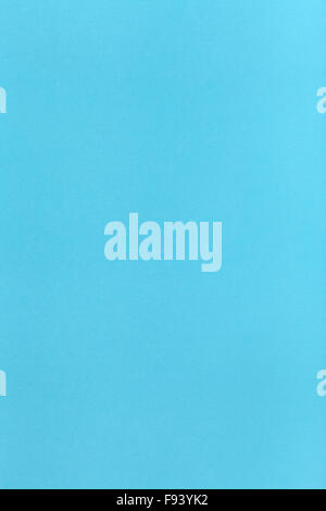 vertical background from light blue colored sheet of paper Stock Photo