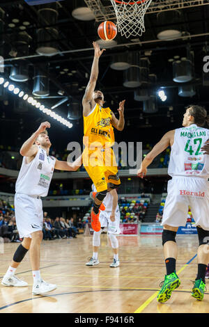 London, UK.13th December 2015. London Lions player Nick Lewis (11) jumps up to the basket during the London Lions vs. Plymouth Raiders BBL game at the Copper Box Arena in the Olympic Park. Plymouth raiders win 114:104 Credit:  Imageplotter/Alamy Live News Stock Photo