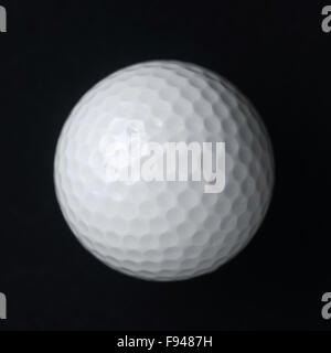 golf ball on black background Stock Photo