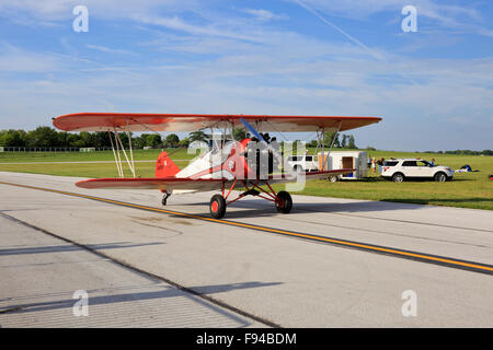 Curtiss-Wright Travel Air 4000 biplane taxiing on a runway. Stock Photo