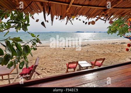 View from a simple beach bar on Klong Muang Beach. Krabi Province, Thailand. Stock Photo