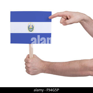 Hand holding small card, isolated on white - Flag of El Salvador Stock Photo