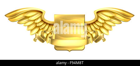 A winged gold golden metal shield heraldic heraldry coat of arms design with a banner scroll Stock Photo