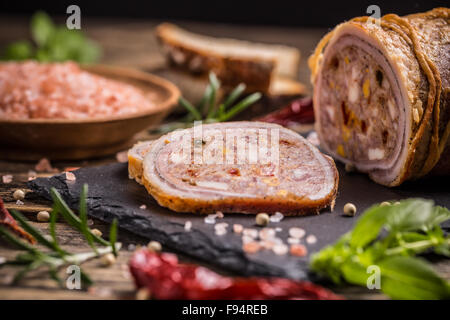 Pork roll filled with minced meat and eggs Stock Photo