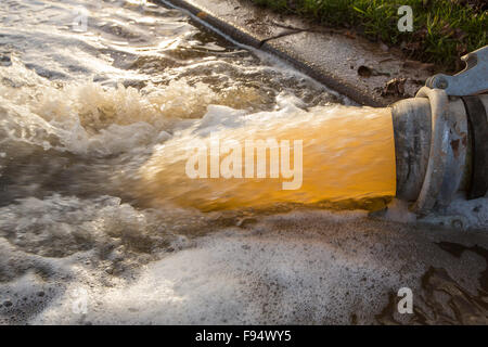 Pumping out floodwater from the Civic Centre in Carlisle, Cumbria on Tuesday 8th December 2015, after torrential rain from storm Desmond. The storm set a new British record for rainfall totals in a day with 341.4mm falling in 24 hours. Stock Photo