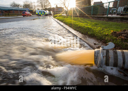 Pumping out floodwater from the Civic Centre in Carlisle, Cumbria on Tuesday 8th December 2015, after torrential rain from storm Desmond. The storm set a new British record for rainfall totals in a day with 341.4mm falling in 24 hours. Stock Photo