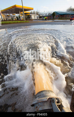 Pumping out floodwater from the Civic Centre in Carlisle, Cumbria on Tuesday 8th December 2015, after torrential rain from storm Desmond. The storm set a new British record for rainfall totals in a day with 341.4mm falling in 24 hours. Stock Photo