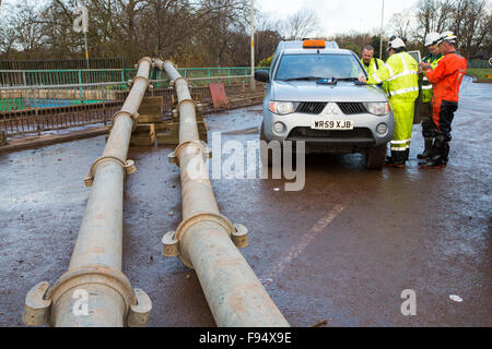 Environment Agency staff Pumping out floodwater from Hardwicke Circus in Carlisle, Cumbria on Tuesday 8th December 2015, after torrential rain from storm Desmond. The storm set a new British record for rainfall totals in a day with 341.4mm falling in 24 hours. Stock Photo